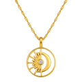 A gold pendant necklace featuring a circular design with a crescent moon, sunburst rays, and a small clear gemstone at the center, displayed on a textured gray background.